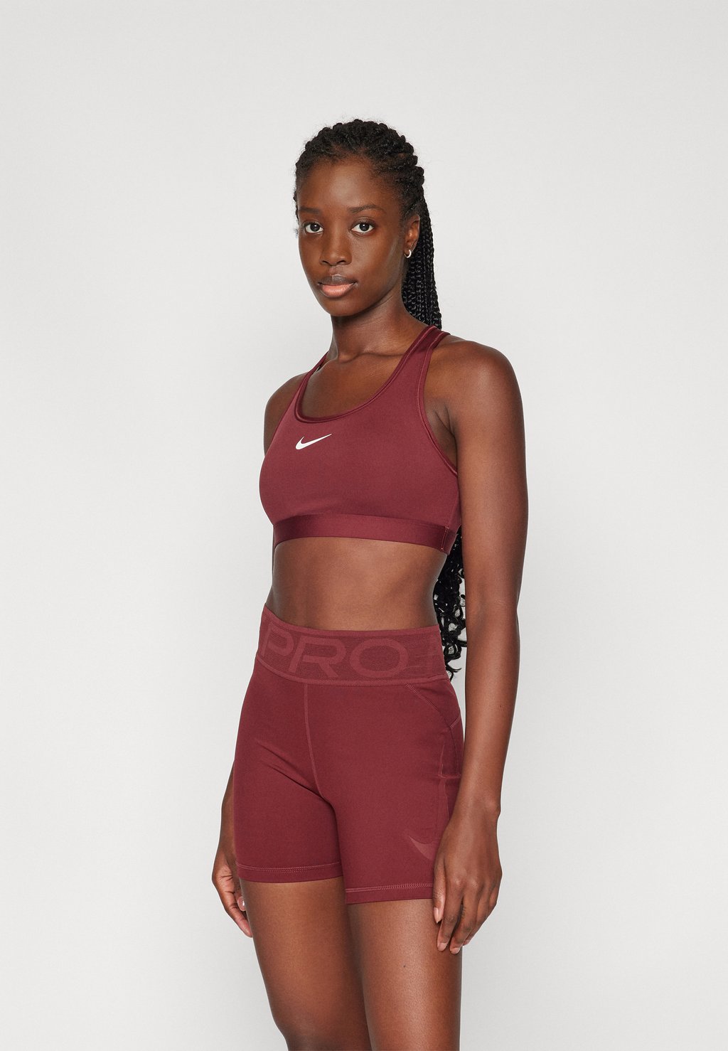 

Спортивный бюстгальтер BRA Nike Performance, темно-красный
