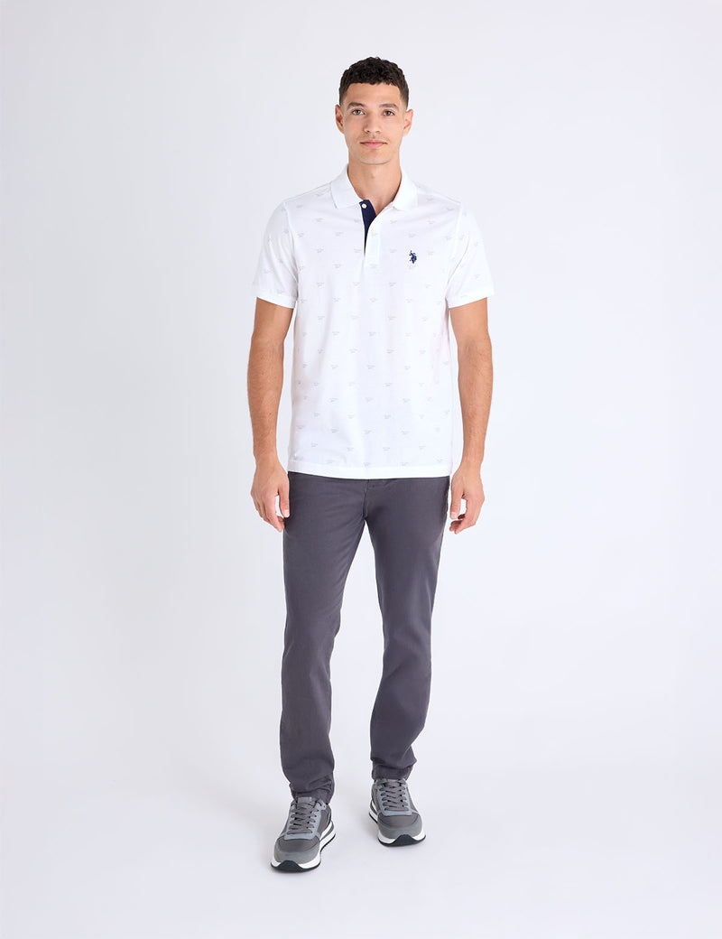 Мужская футболка-поло U.S. Polo Assn. All Over Wordmark Graphic Print Jersey, белый — фото 4