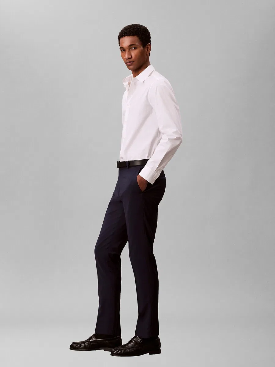 Зауженные плиссированные брюки Calvin Klein черного цвета — фото 4