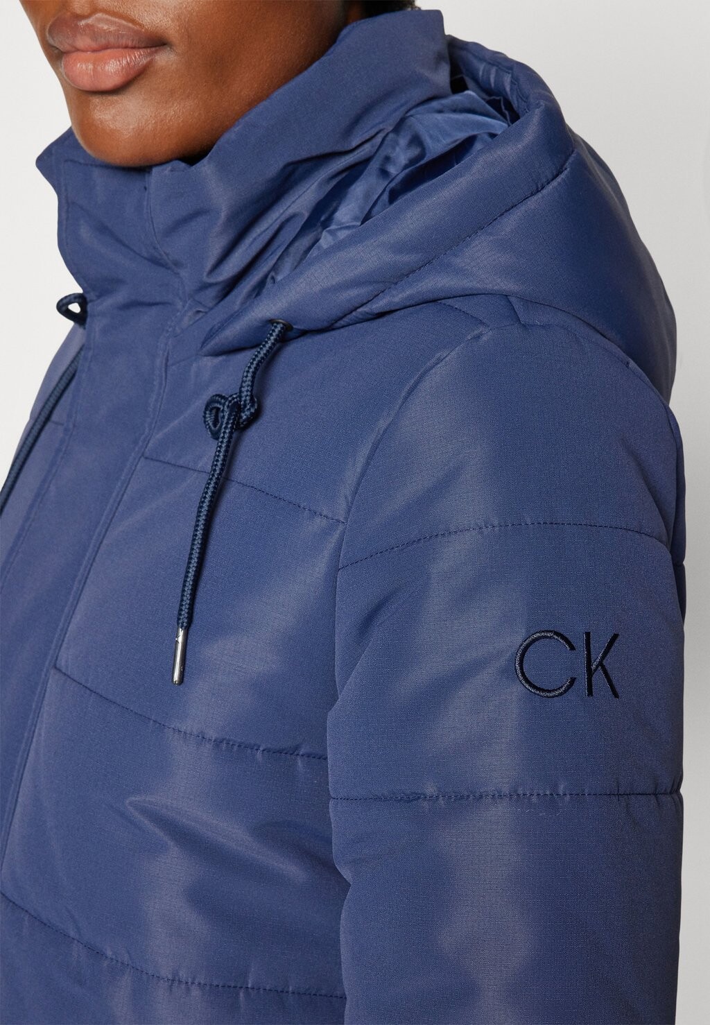 

Зимнее пальто WOODSEN JACKET Calvin Klein Golf, темно-синий