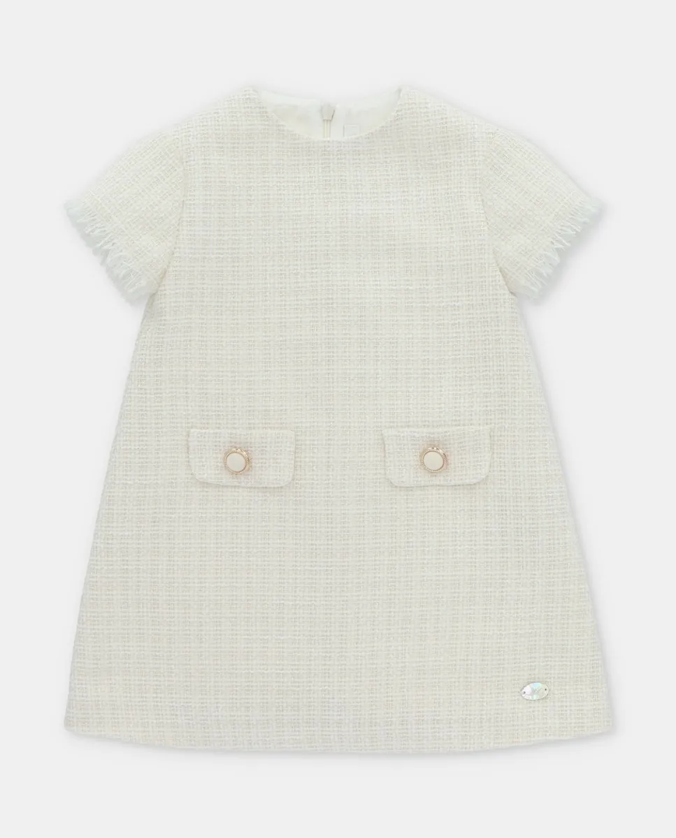 

Детское платье из ткани с мелким принтом на бежевом фоне Martín Aranda