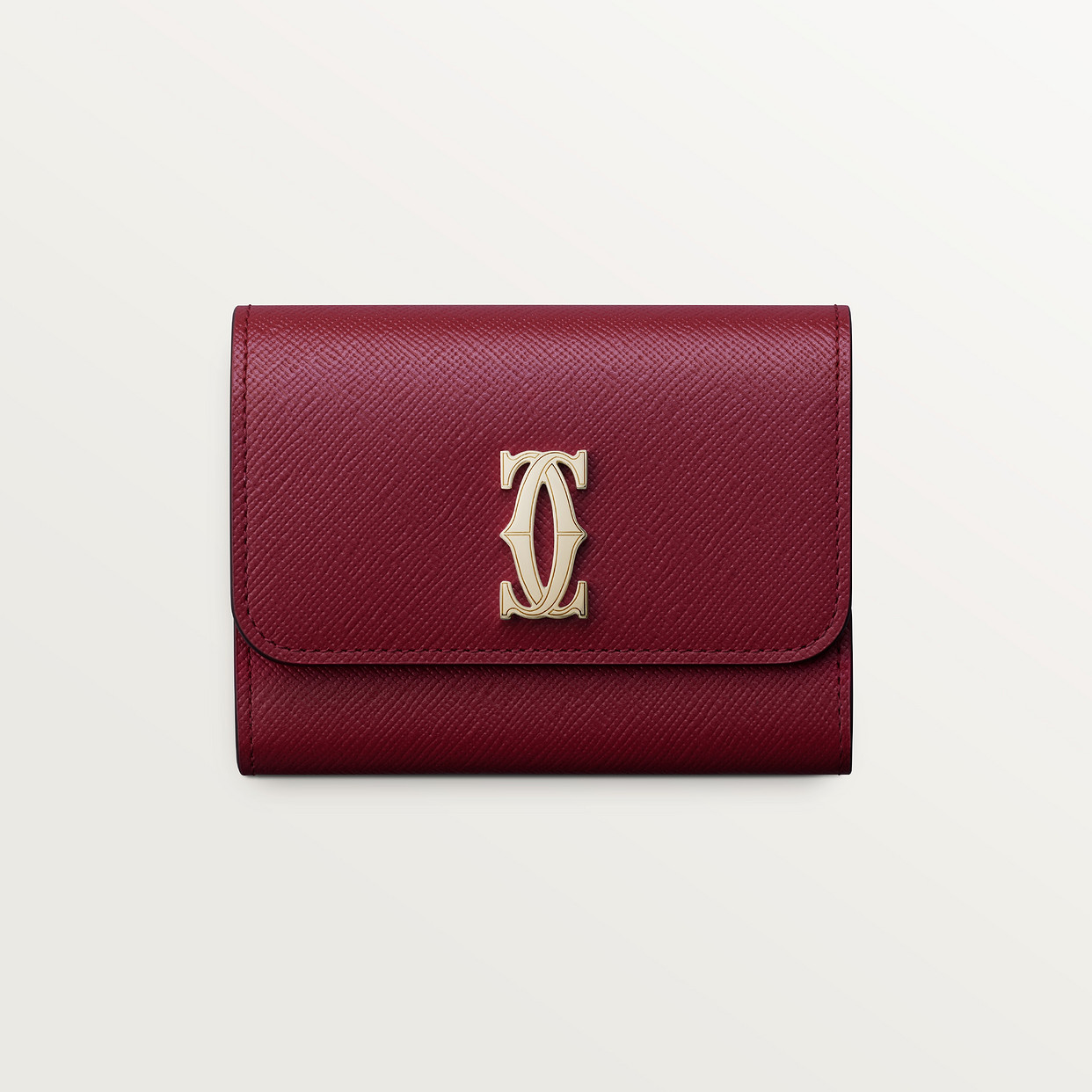 

Кошелек Cartier Portefeuille mini, C de Cartier, текстурированная телячья кожа вишнево-красного цвета