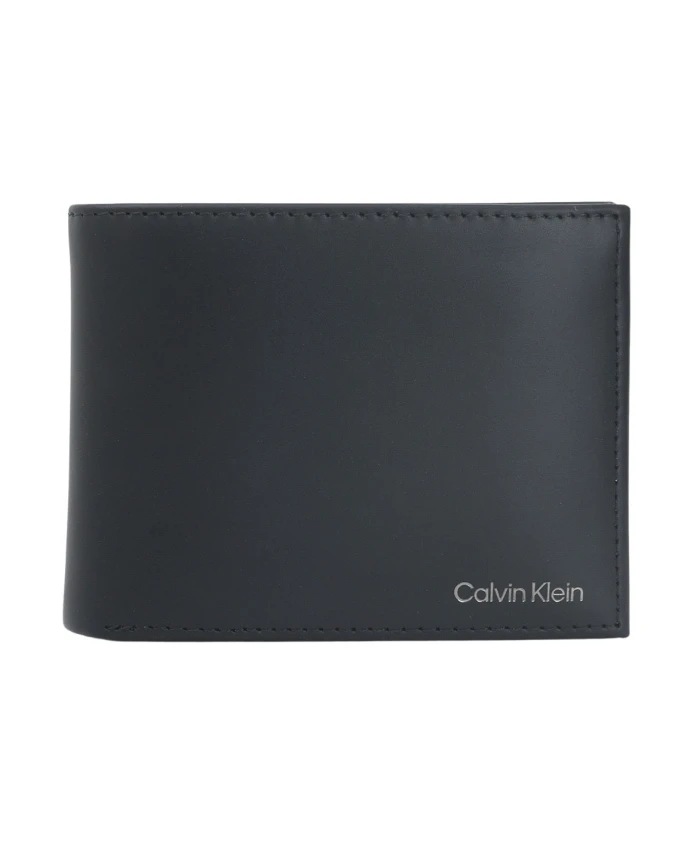 

Черный кошелек с едва заметным логотипом. Calvin Klein, черный