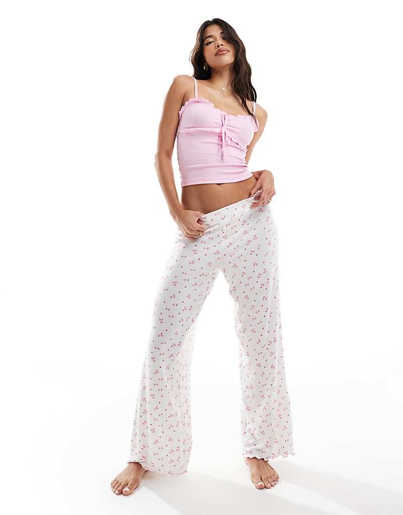 

Boux Avenue Pajama: розовая майка в рубчик и брюки с вишневым принтом