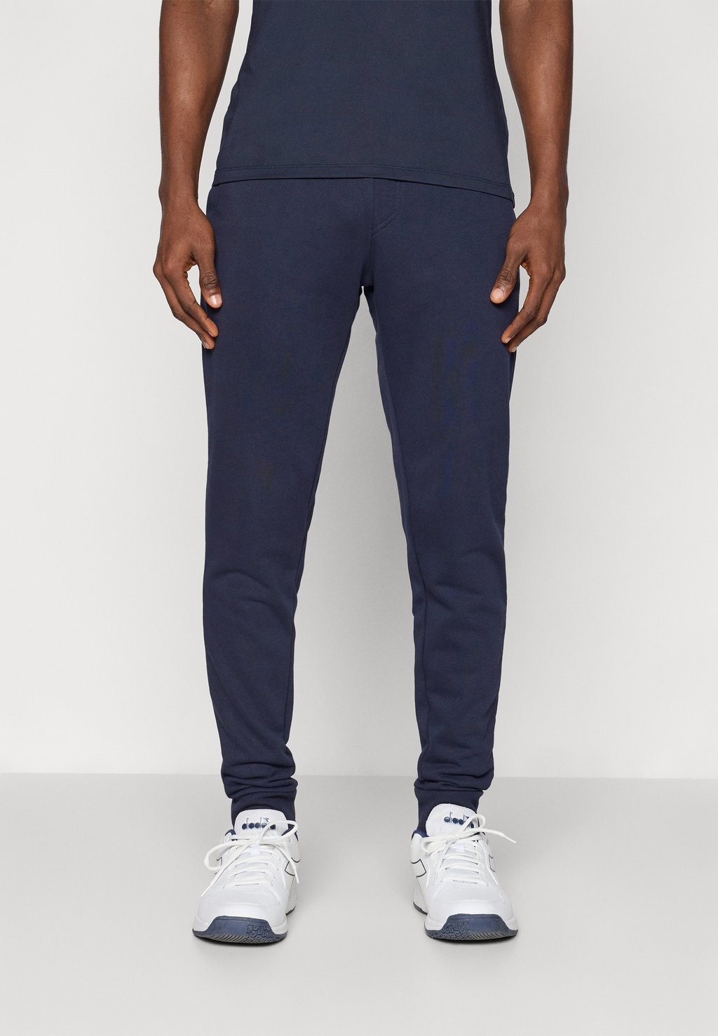 

Спортивные штаны ESSENTIAL SWEATPANTS Björn Borg, темно-синий