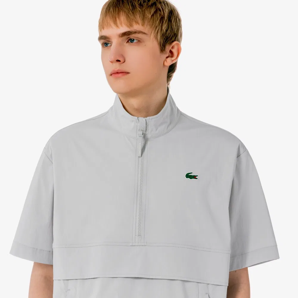 Мужской эластичный тканый анорак светло-серый от Lacoste — фото 2