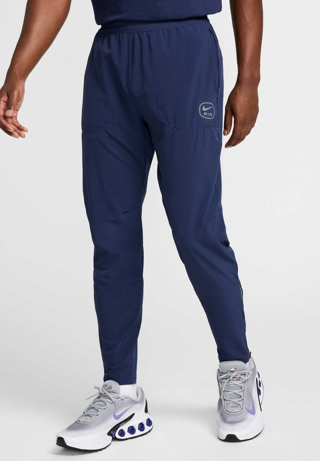 

Спортивные штаны AIR Nike Sportswear, темно-синий