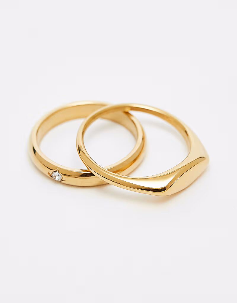 

Комплект из двух тонких водонепроницаемых колец-печаток из нержавеющей стали с кристаллами в золотой оправе Asos Design