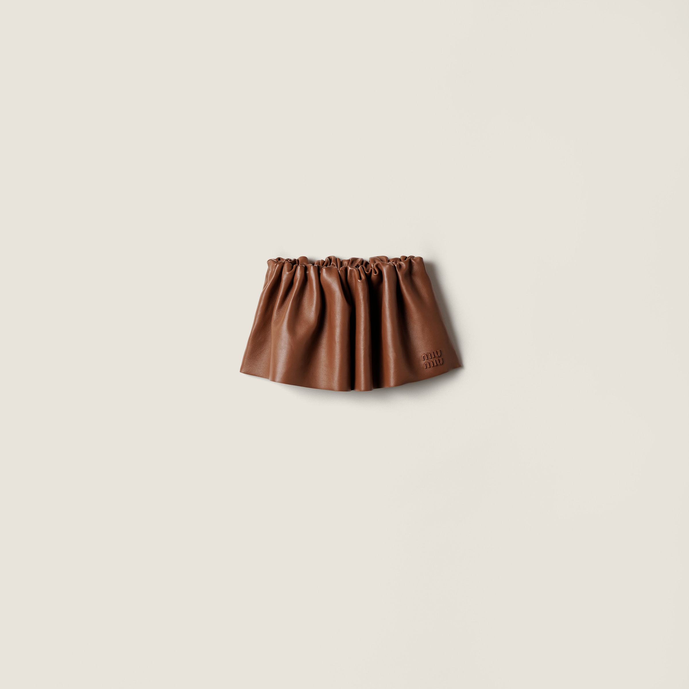 

Мини-юбка из кожи наппа plongé MIU MIU, палисандр
