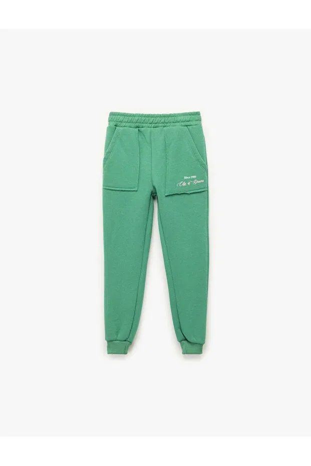 Детские спортивные штаны для девочек с принтом Jogger sweatpants with raised print and pocket detail Koton, Green — фото 3