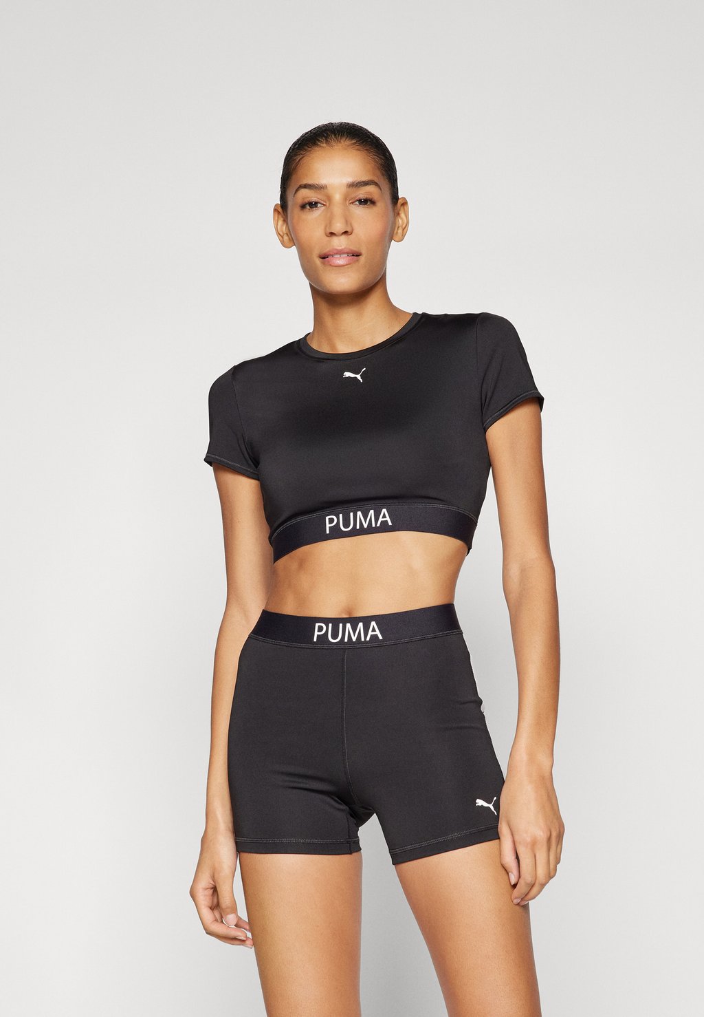 

Спортивная футболка STRONG TEE SHORT Puma, черный