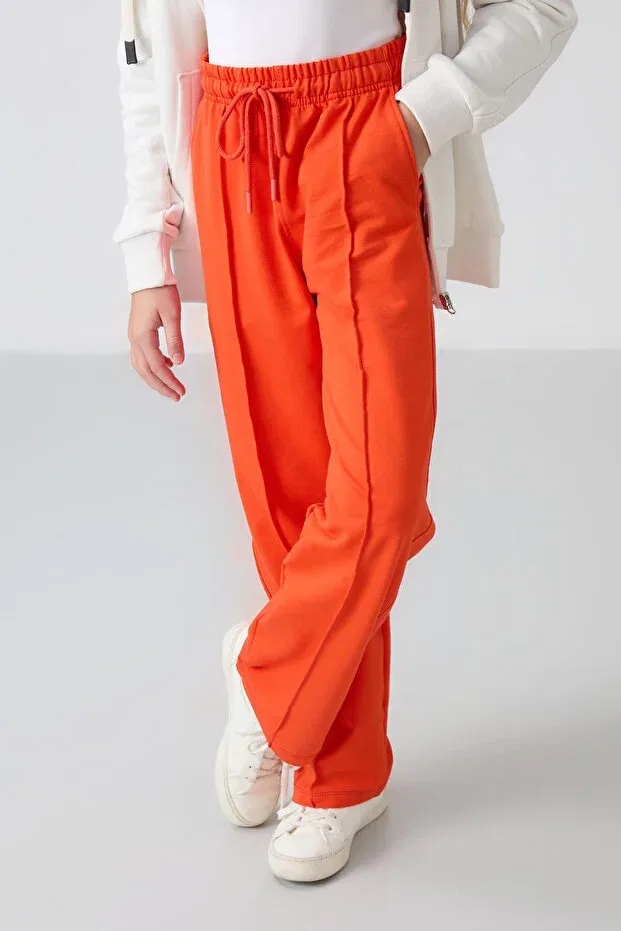 Детские джоггеры для девочек с широкой штаниной Orange wide-legged girls' sweatpants with pockets and front stitching detail -75144 Tommy Life, Orange — фото 3