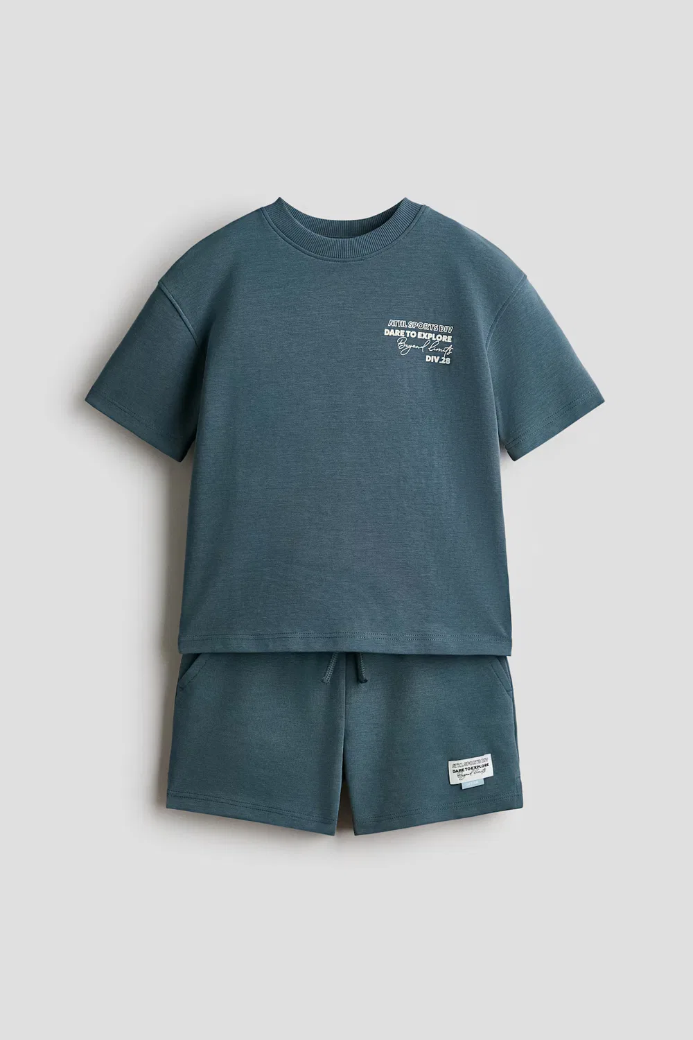Костюм-Двойка, состоящий из футболки и спортивных шорт H&M, Dunkeltürkis/Dare To Explore