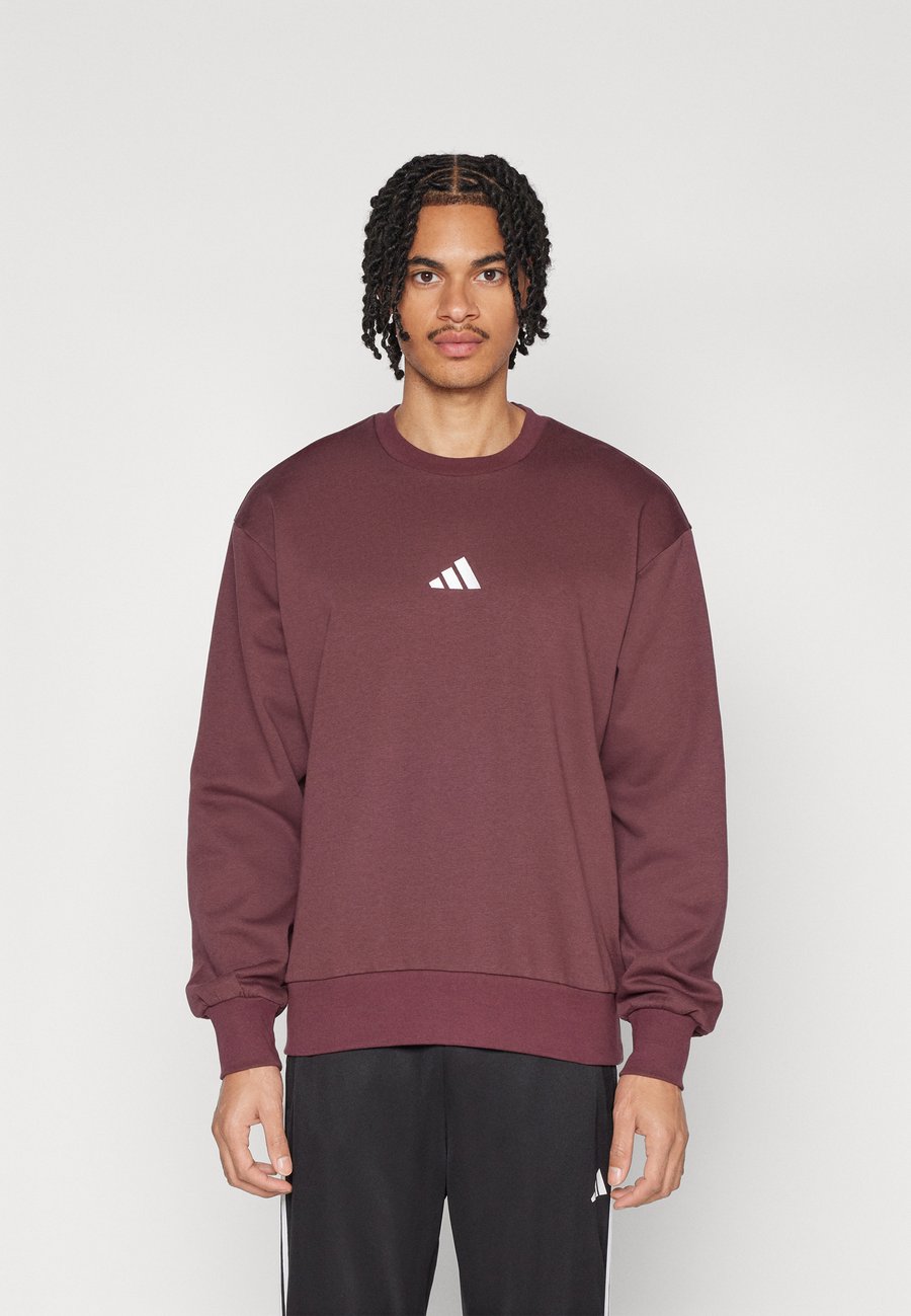 

Толстовка Adidas Sportswear M FEELCOZY SWT, Aurora Ruby/White/Dark Red