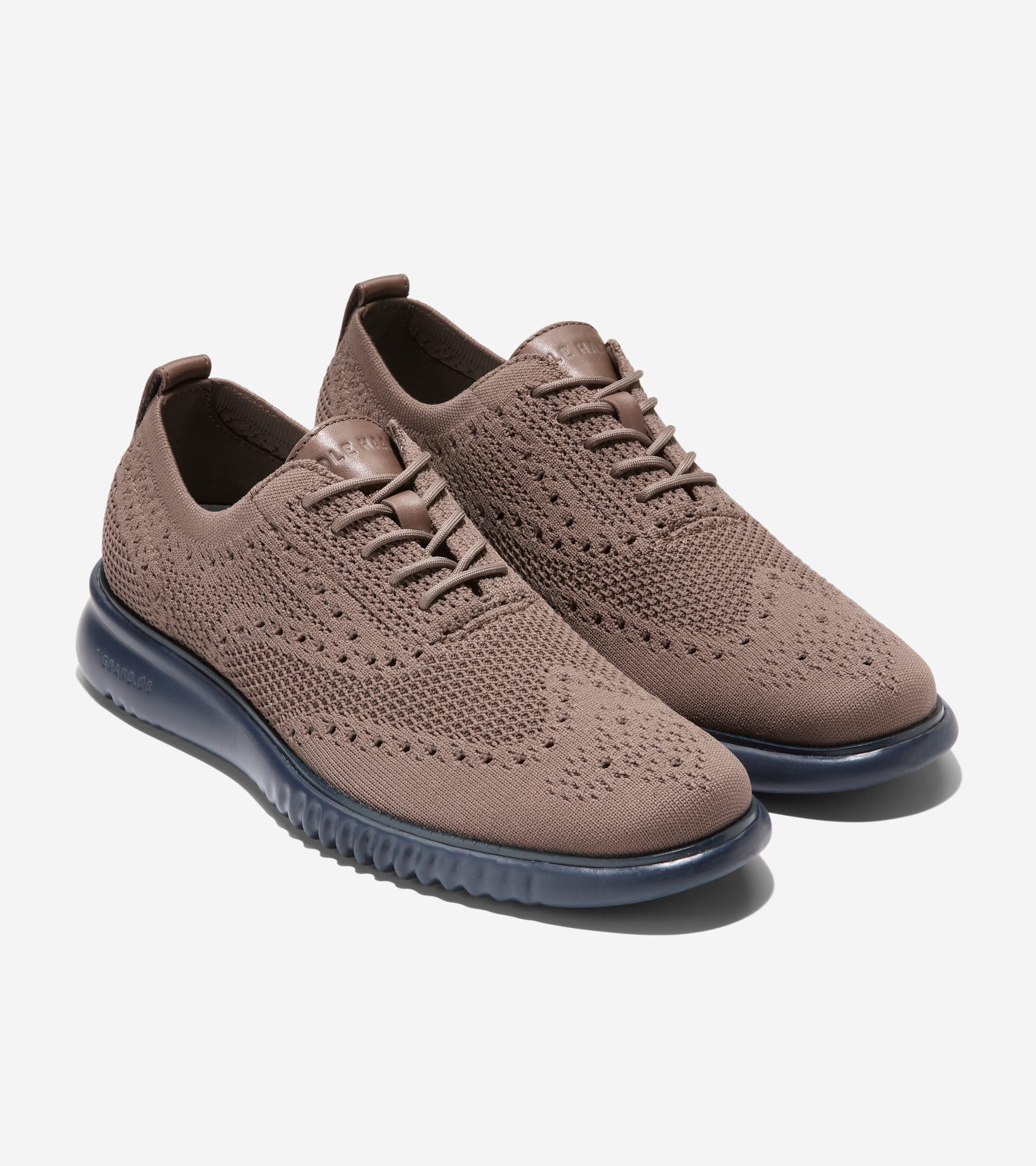 

Мужские оксфорды Cole Haan 2.ZEROGRAND Wingtip Oxford, цвет lava-blueberry-truffle