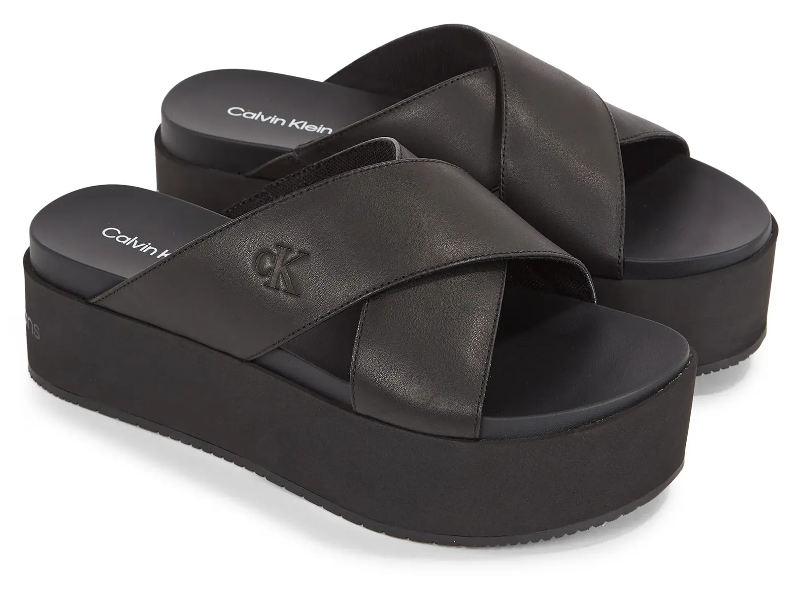 

Мюли Calvin Klein Jeans "FLATFORM CROSS MG UC", платформа, летняя обувь, тапочки с поперечной повязкой, черный