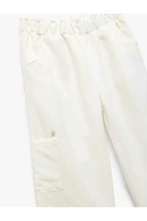 Детские брюки карго для девочек хлопковые Viscose blended pocketed loose fit cargo pants Koton, Ecru — фото 3