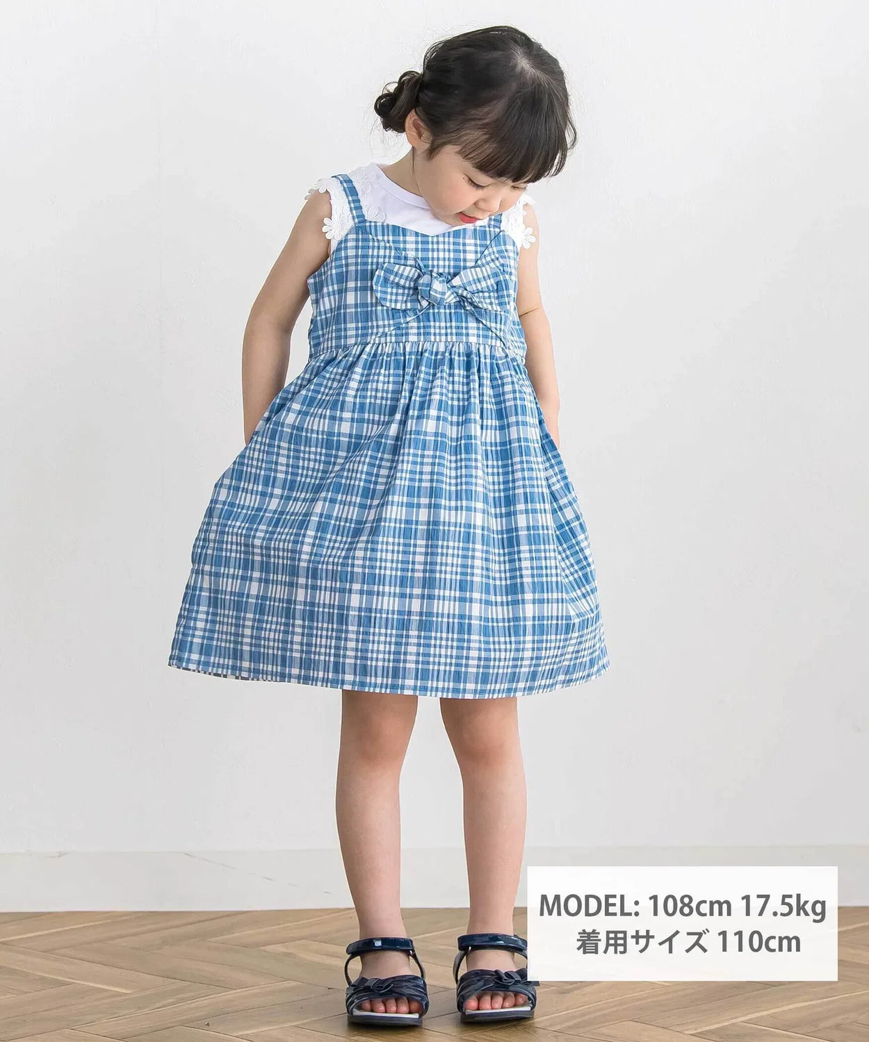 Детское платье-комбинезон с принтом в клетку и бантом BeBe Petits Pois Vert, Black — фото 2