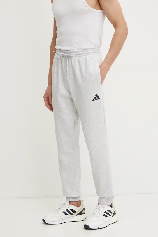 

Уютные спортивные брюки Feelcozy Adidas, серый
