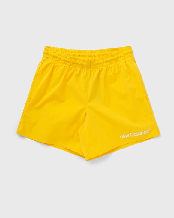 

Шорты New Balance Archive Stretch Woven Short, цвет trueyell (llr)