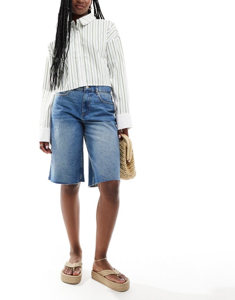 

Длинные синие мешковатые джинсовые шорты ASOS DESIGN