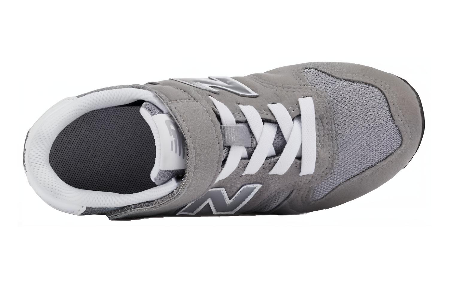 Низкие детские беговые кроссовки New Balance 373 серые — фото 2