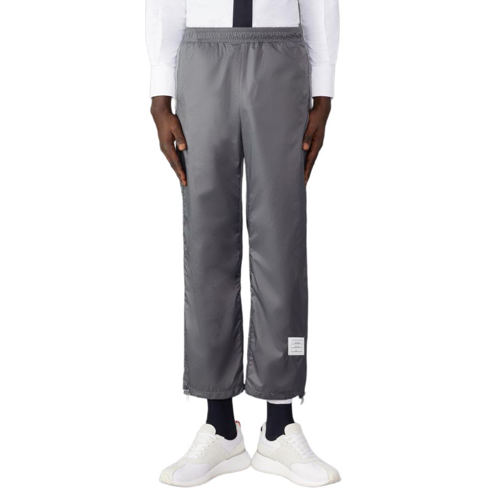 

Брюки спортивные из прозрачного рипстопа с нашивкой-логотипом THOM BROWNE, серые