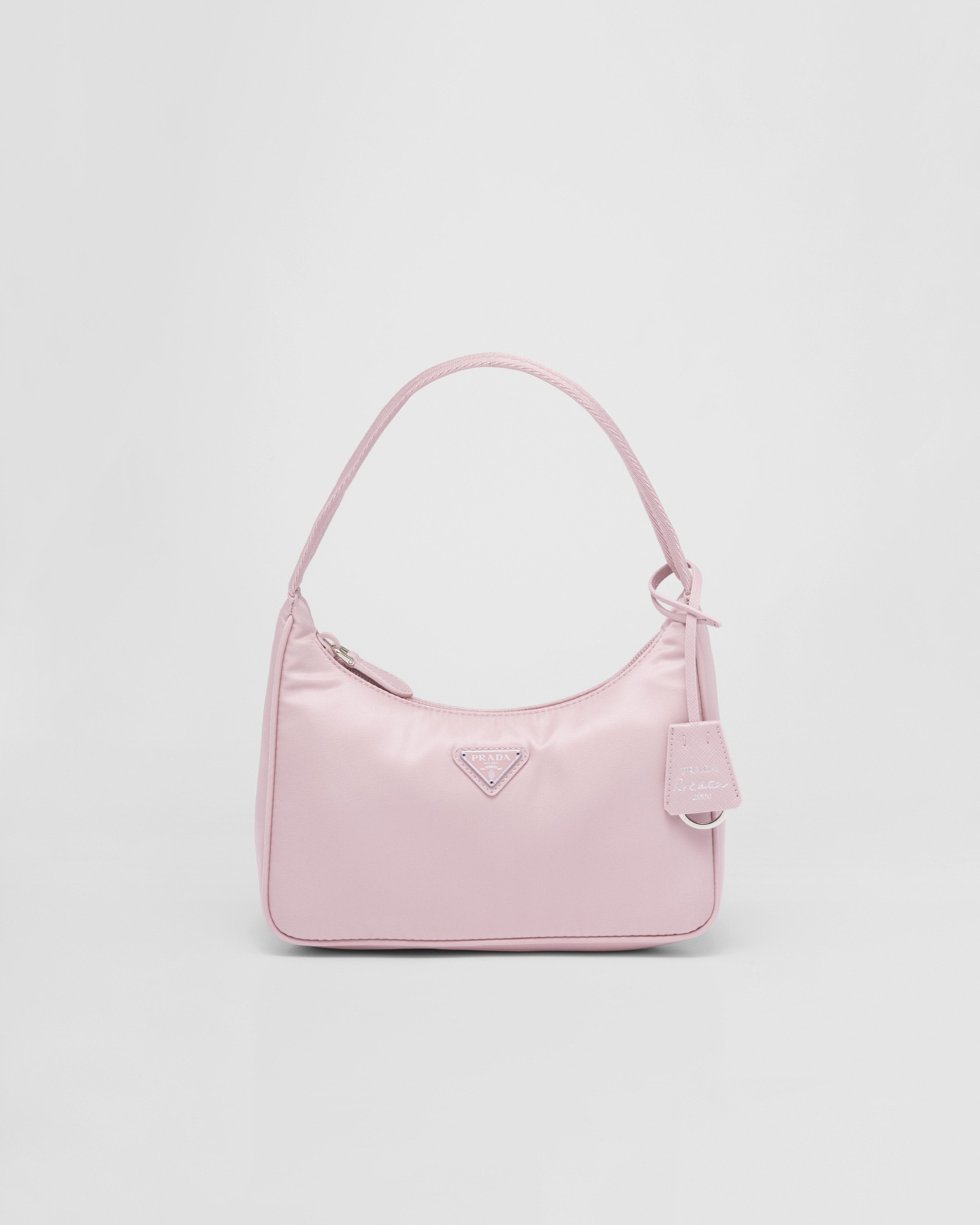 

Мини-сумка Prada Re-Edition 2000 из переработанного нейлона, розовый