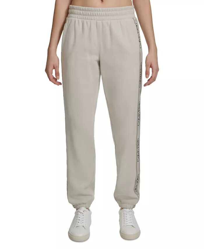 

Женские джоггеры Performance из экофлиса в полоску с логотипом Calvin Klein, бежевый