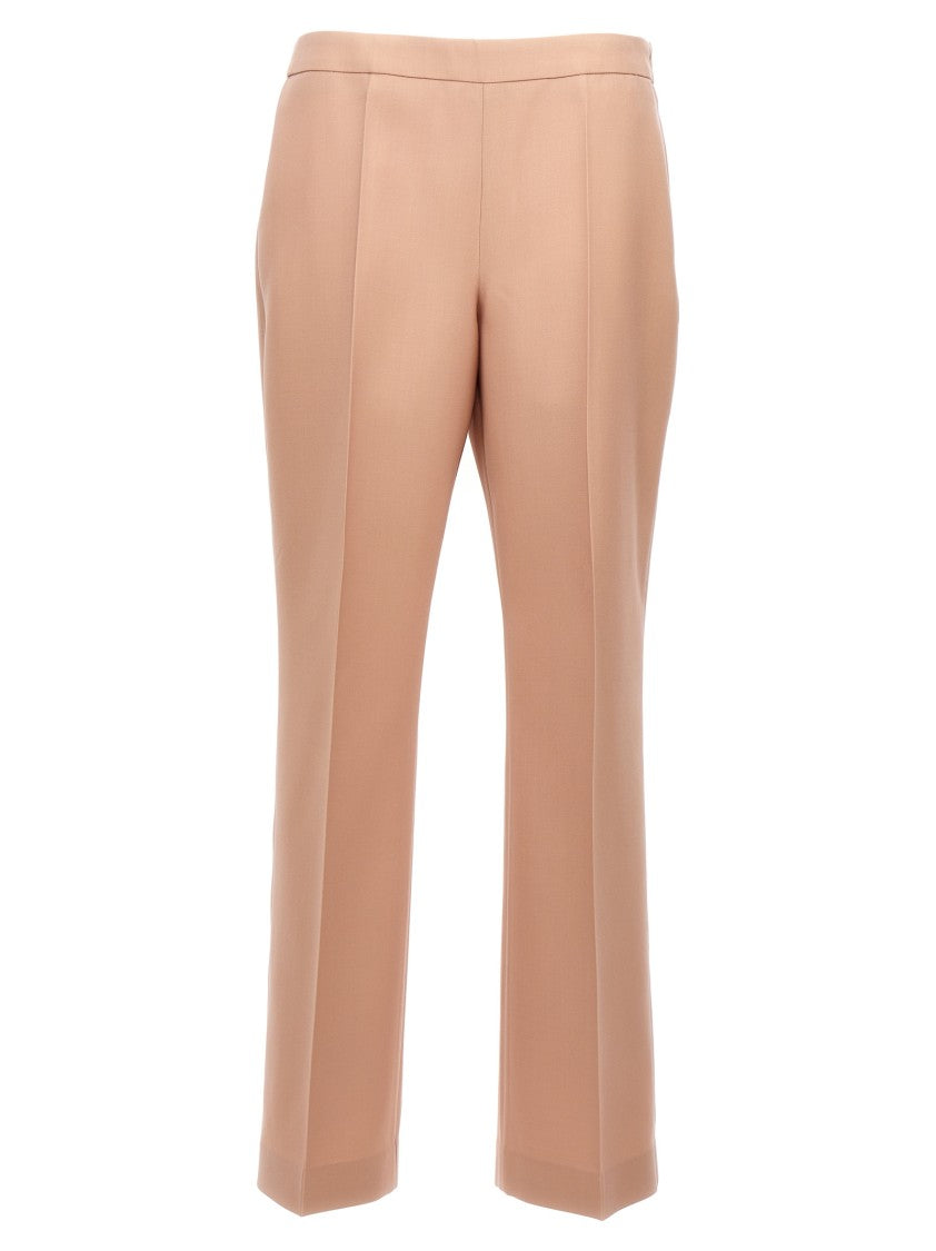 

Шерстяные брюки со складками Jil Sander, розовый