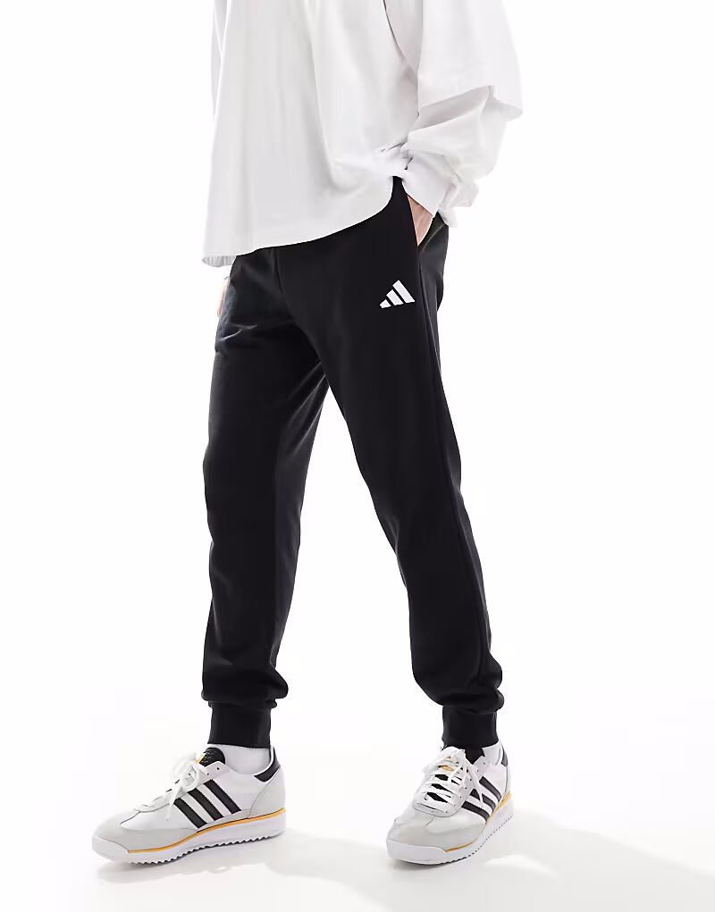 Уютные брюки из французского трикотажа Adidas Essentials черного и белого цвета Adidas Performance — фото 3