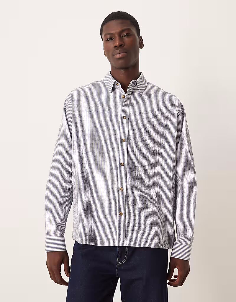 

Рубашка свободного кроя из сирсакера в полоску темно-синего цвета Asos Design