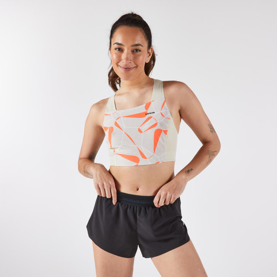 

KIPRUN Женская беговая футболка-кроп-топ - 900 Light Replica Obvious бежевого цвета