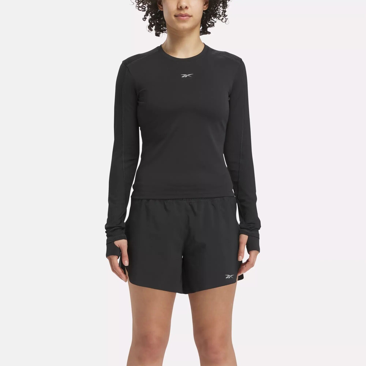 

Беговая куртка с длинными рукавами Reebok, черный