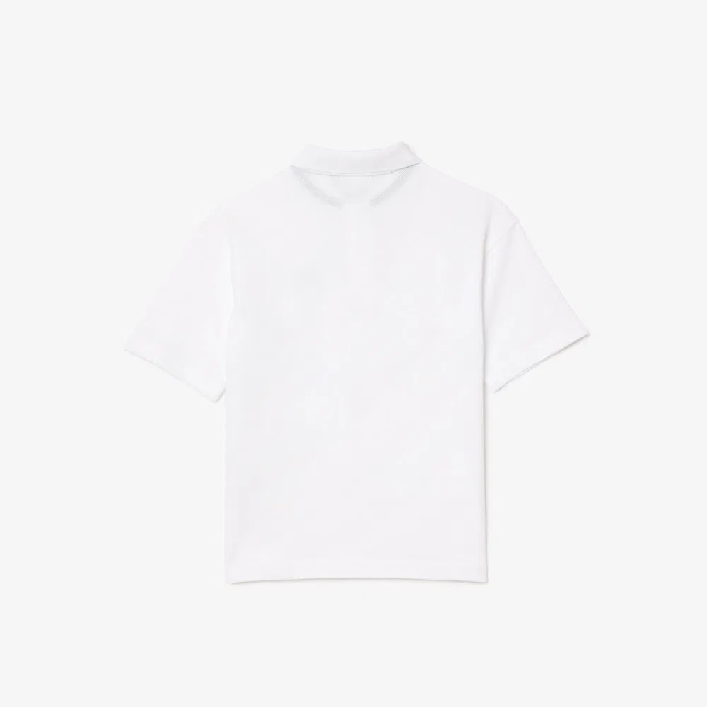 Детская рубашка-поло свободного кроя с коротким рукавом белого цвета от Lacoste — фото 3