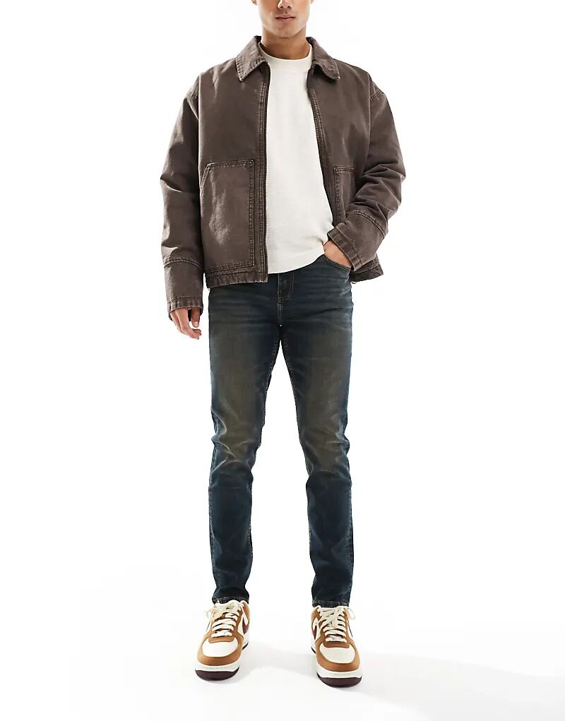 

Узкие джинсы ASOS DESIGN с оттенком темно-синего цвета