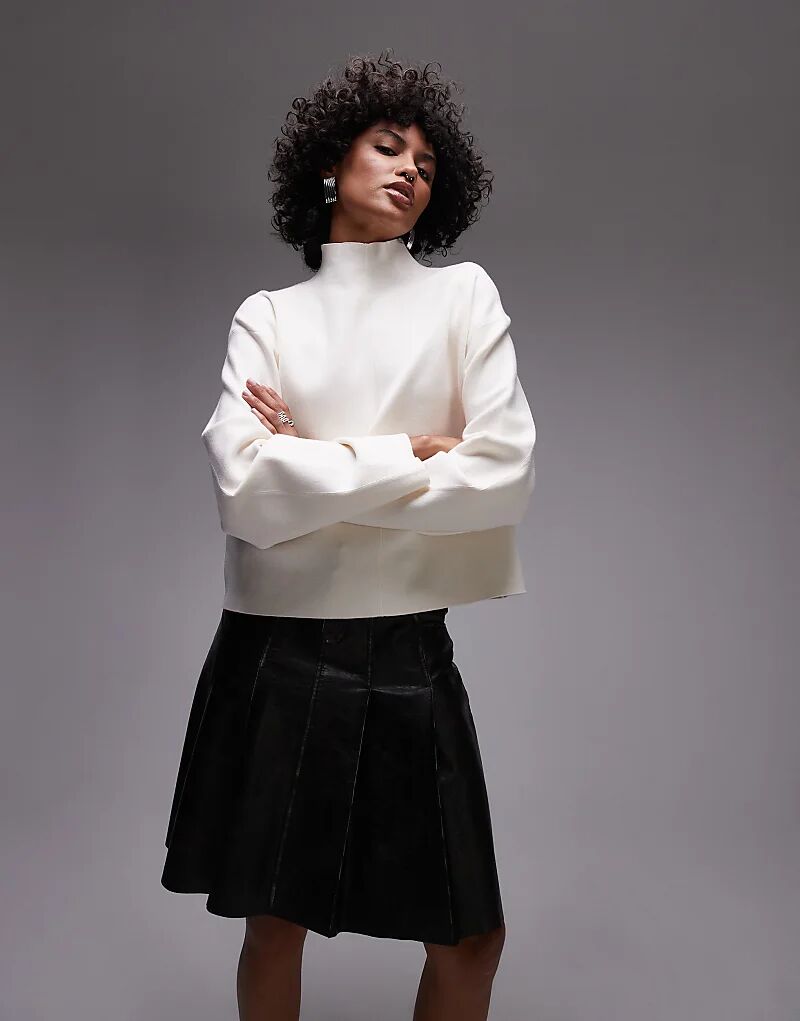 

Свитер плотной вязки с высоким воротом и фигурными рукавами в цвете «кремовый» & Other Stories