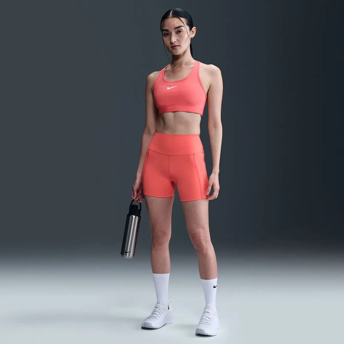 

Короткие женские леггинсы Nike DF One 5'', оранжевый