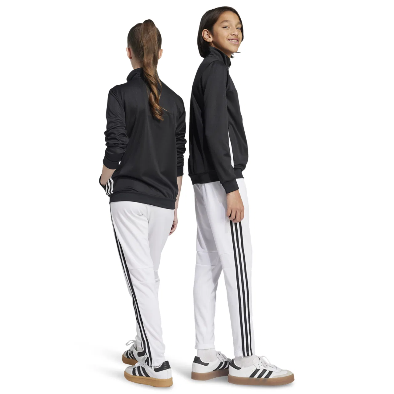 Брюки тренировочные для мальчиков Tiro 25 Essentials Adidas, белый/черный — фото 2