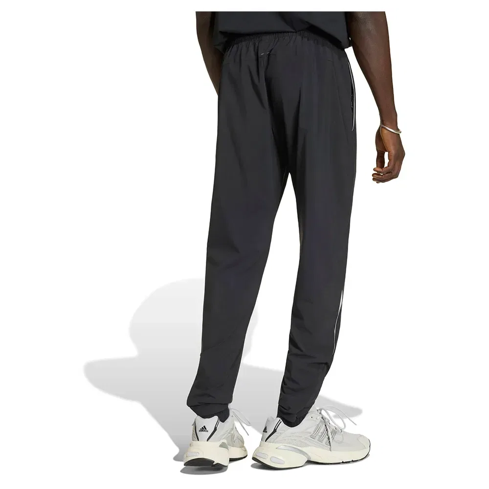 Брюки тканые Tech Trefoil Essentials Woven Adidas Originals, черный — фото 2