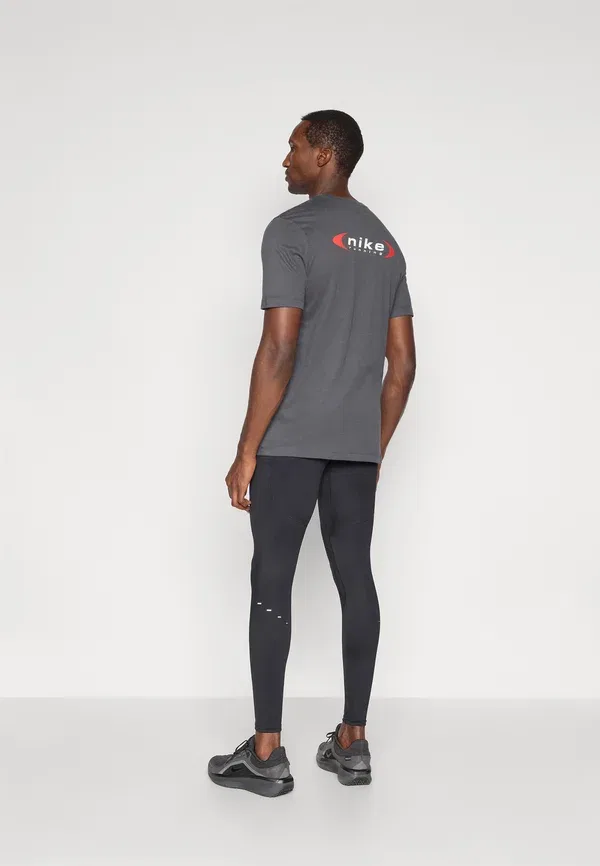 Леггинсы дышащие Stride Nike Performance/Reflective Silver, черный — фото 3