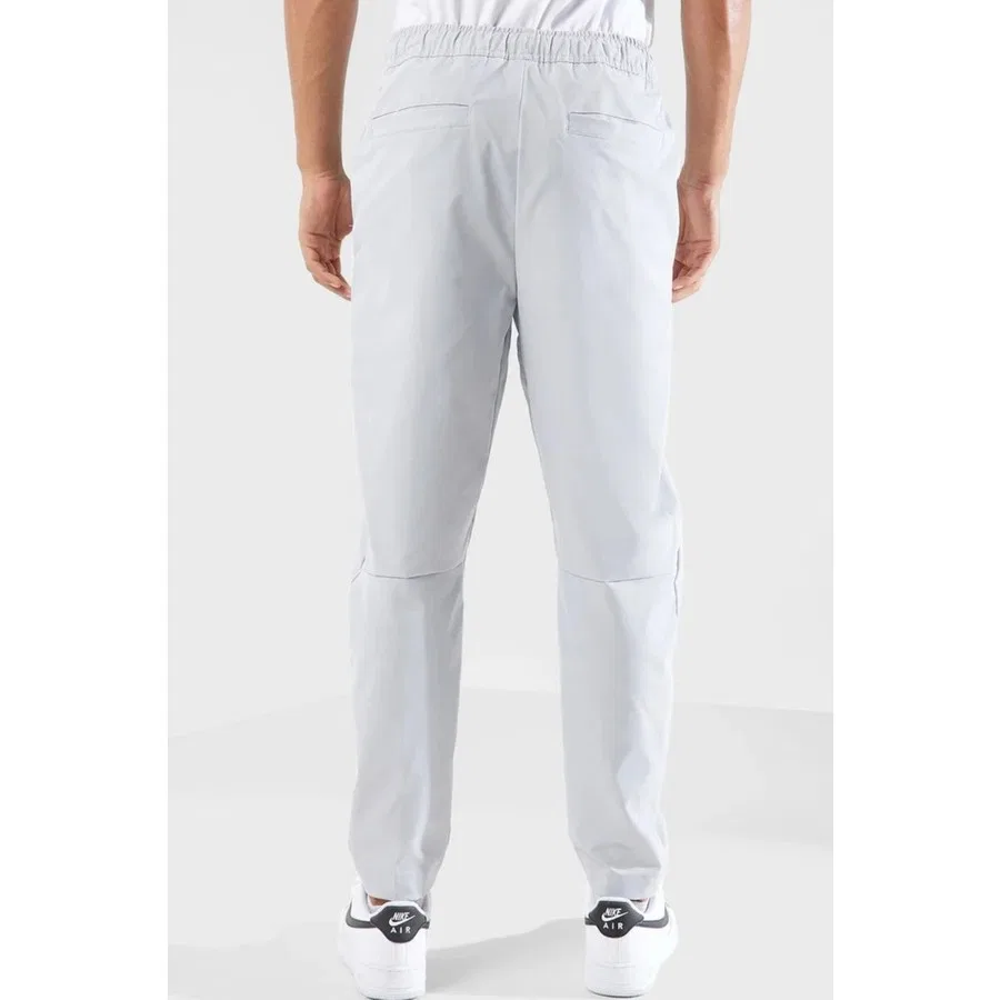 Спортивные брюки с зауженным кроем Nike Club Taper Leg, Серый — фото 3