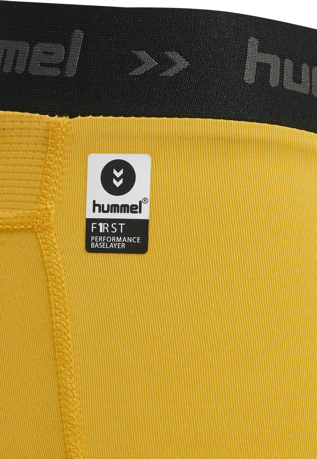 Детские леггинсы с принтом HML First Performan Kids Tig Shorts Hummel, Fluoreszierendes Neongelb — фото 4