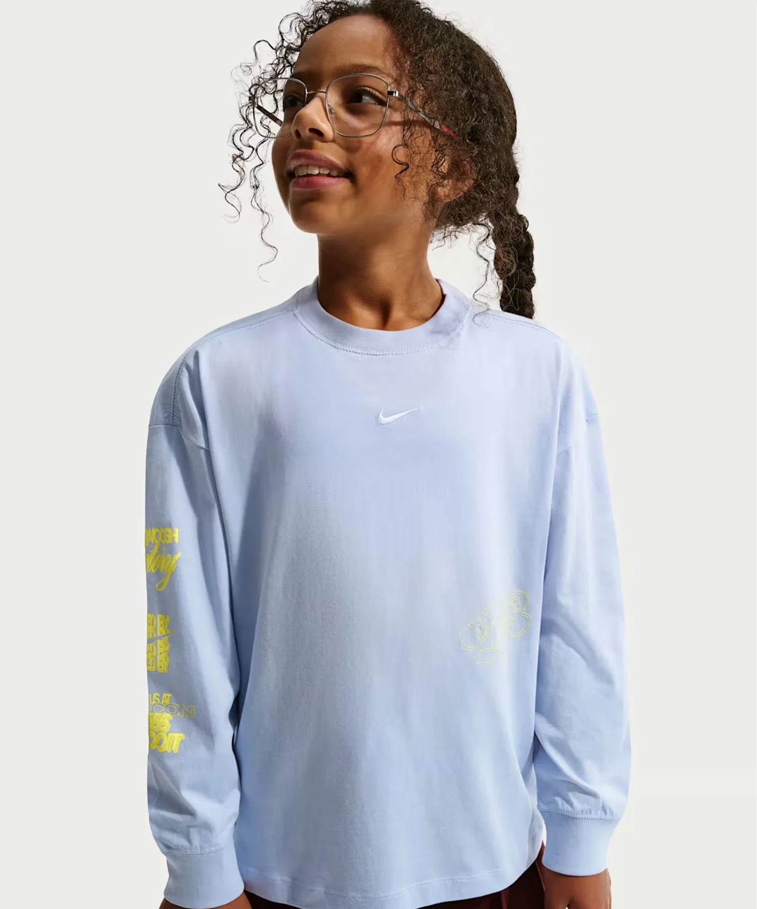 Детская футболка с длинным рукавом Nike G NSW TEE LS GFX OS серая