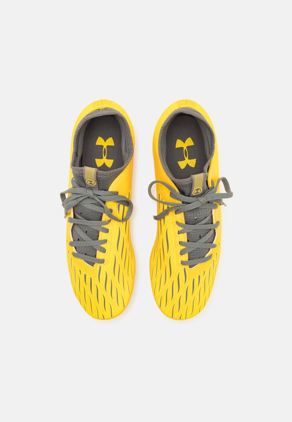 

Футбольные бутсы с формованными шипами MAGNETICO SELECT 4 FG Under Armour, желтый
