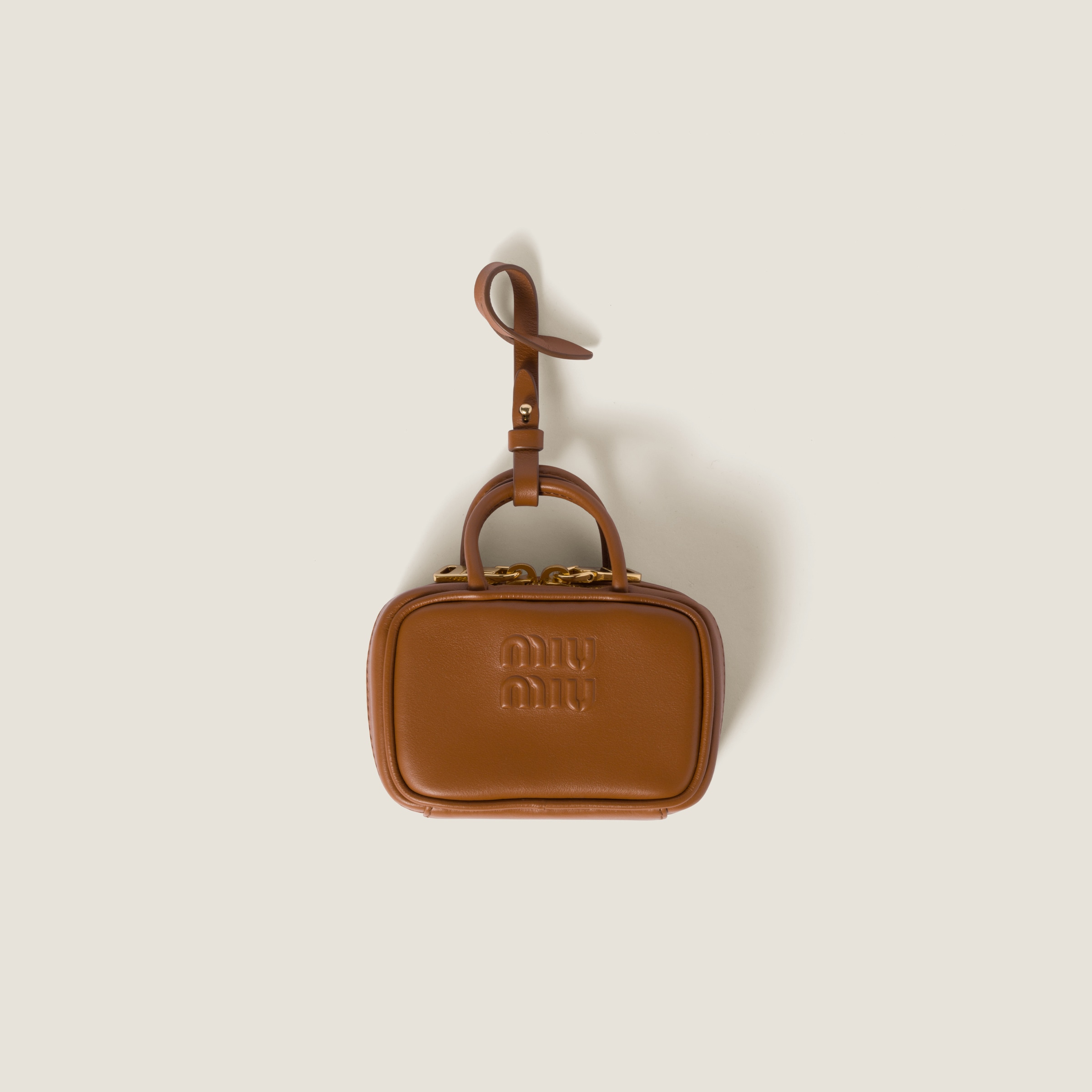 

Микросумка beau из кожи MIU MIU, коньячный