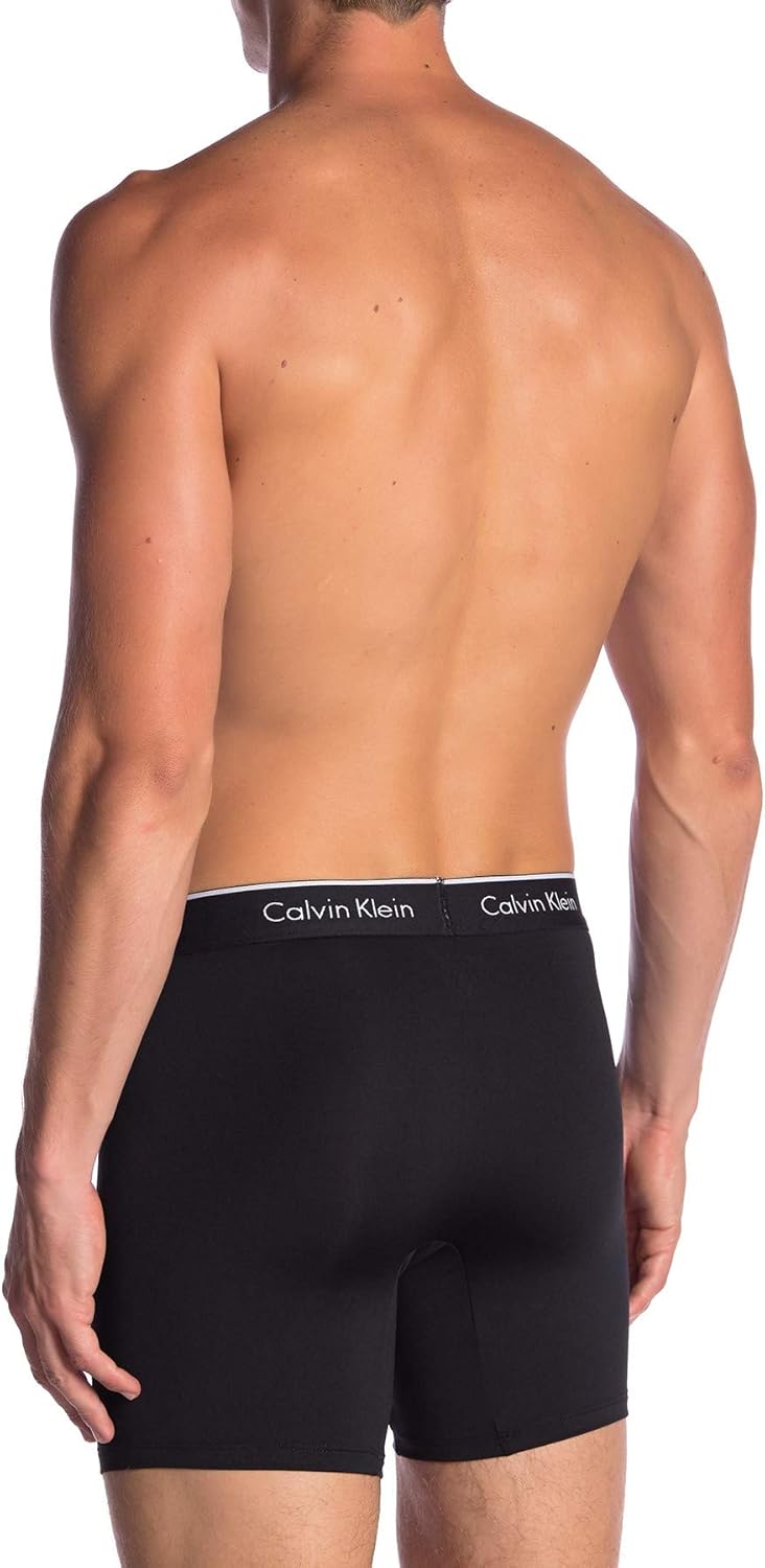 Женские трусики-стринги Calvin Klein Perfectly Fit #F2544, Black(Np2147-001)/White — фото 2