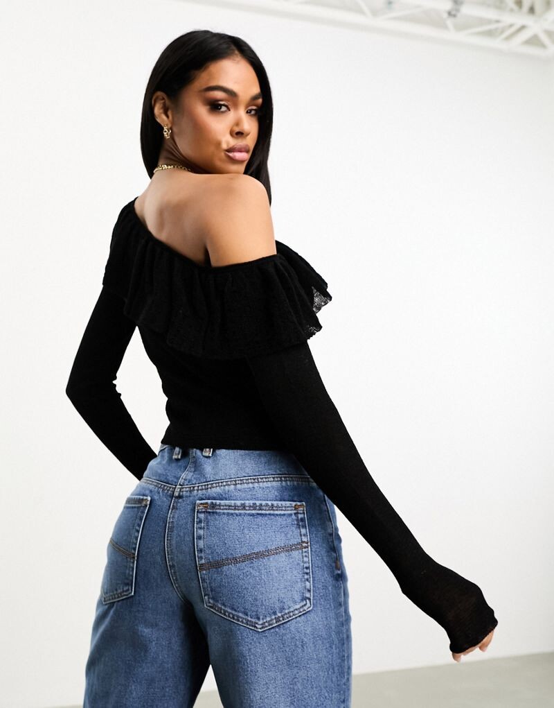 

Черный вязаный свитер с асимметричной оборкой ASOS DESIGN