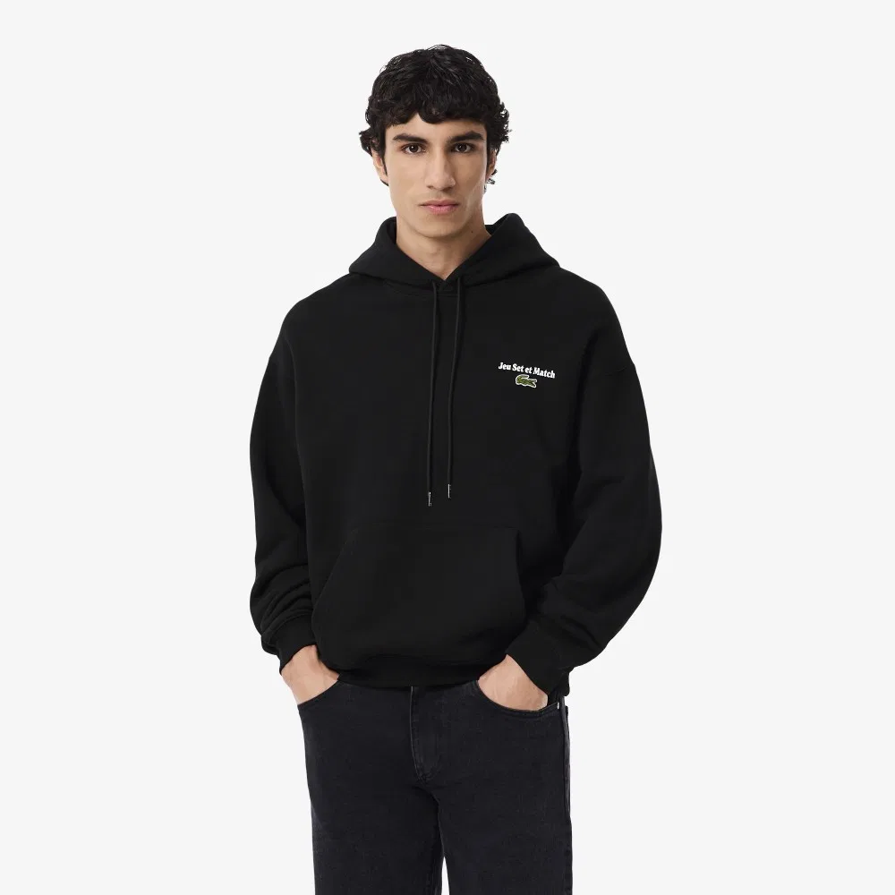 Мужское худи свободного кроя с графическим принтом SH5947-55N чёрное от Lacoste