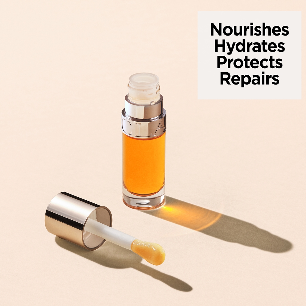 Масло для губ с увлажняющим эффектом Clarins, atspalvis 01 honey 7 мл — фото 3